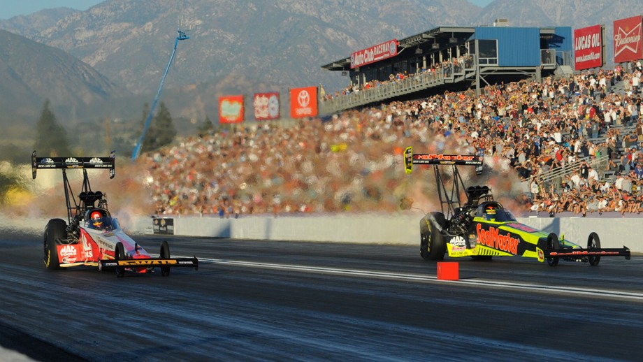 NHRA dragsters on track